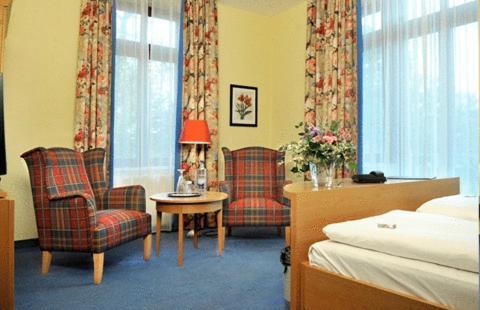 Hotel Am Kurpark 쇼네베크 객실 사진